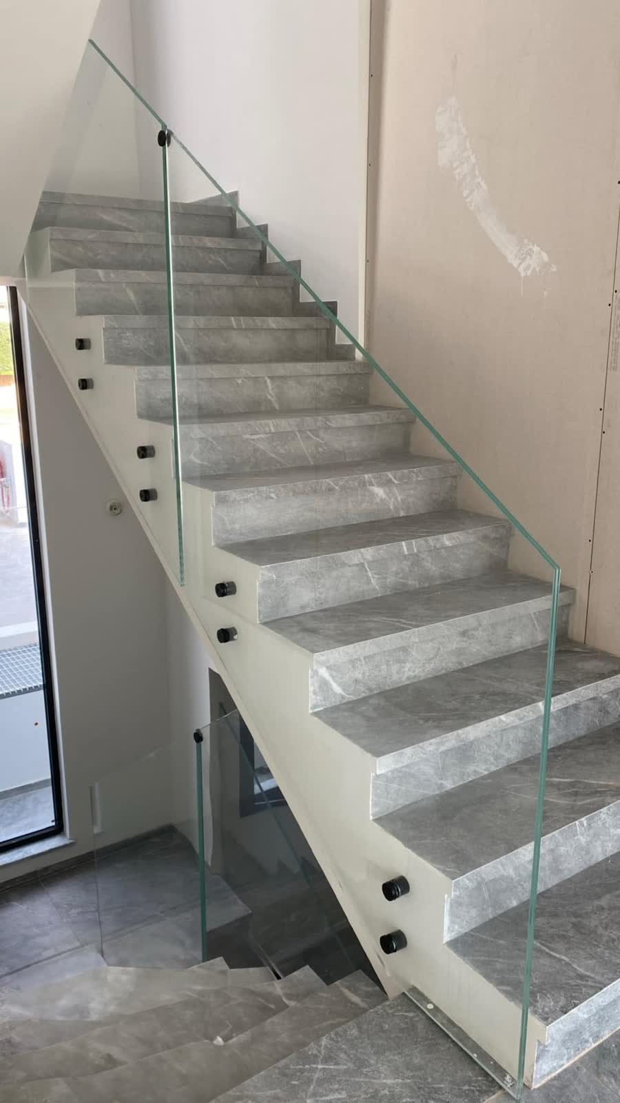 Interior staircase glass railing installed by Aluminum Glass Pro Systems