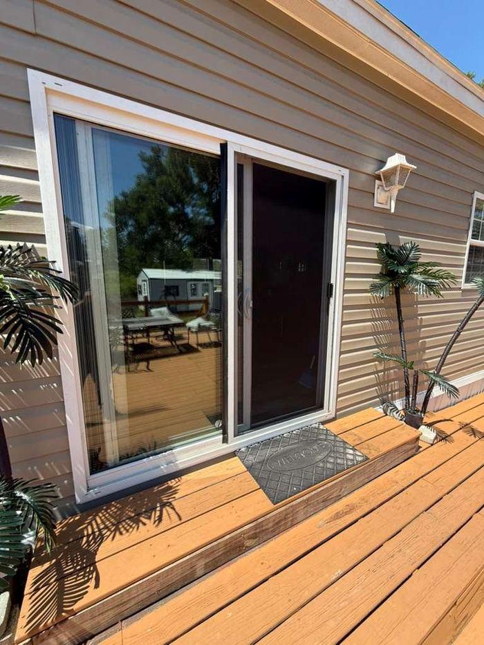 Sliding glass door back on track and working after a Tampa repair