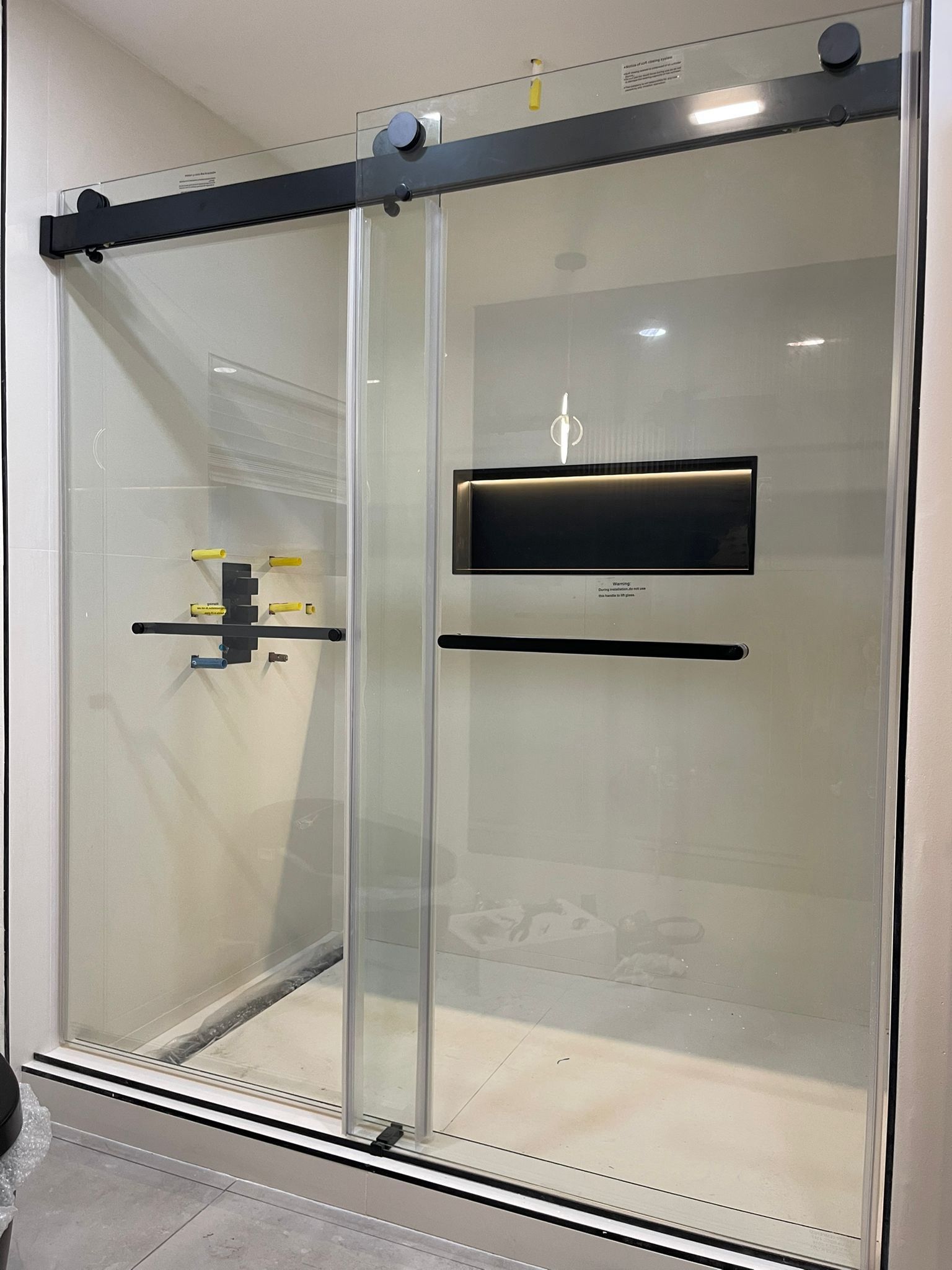 sliding shower door by Aluminum Glass Pro Systems